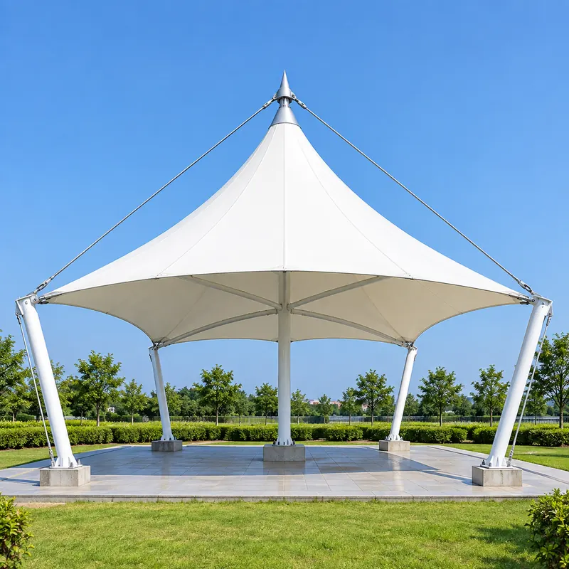 Single large conical tensile canopy on a paved plaza